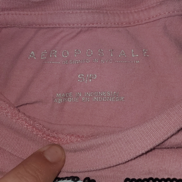 A nice Aeropostale sequined shirt, it does have a small hole in the back - Picture 2 of 4